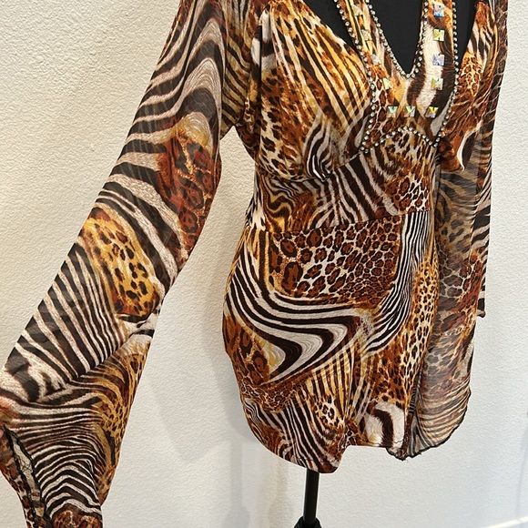 Leopard print dress. Can be use as a blouse with leggings - Picture 4 of 9